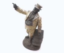 Late 19th or early 20th Century Spelter figure of a portly gent and barrel, marked to base “