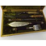 Cased five piece Horn handled and Silver banded Carving and Fish Serving set, the Mahogany case with