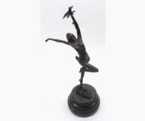 20th Century Bronze figure of a dancing lady with bird raised on a polished marble base, marked “