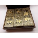 An Oriental Lacquered and Chinoiserie decorated rectangular Covered Box, the interior fitted with