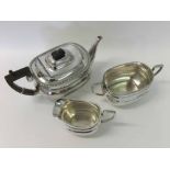 A late 19th/early 20th Century Three Piece Electroplated Tea Set of compressed rectangular form,