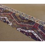 A Kilim Runner or Wall Hanging, decorated throughout with panels of geometric designs within a three
