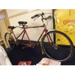 A 1959 Coventry Eagle Tandem in burgundy and cream painted finish with spoked wheels and twin