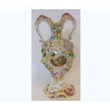 A 19th Century English Two-Handled Baluster Vase, encrusted with flowers and painted in colours, and