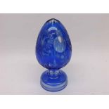 A decorative Bohemian style blue glass finial of conical form, engraved with armorial-type designs