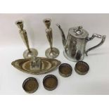 A Mixed Lot comprising: a pair of Evans Electroplated Candlesticks; a set of four Circular small