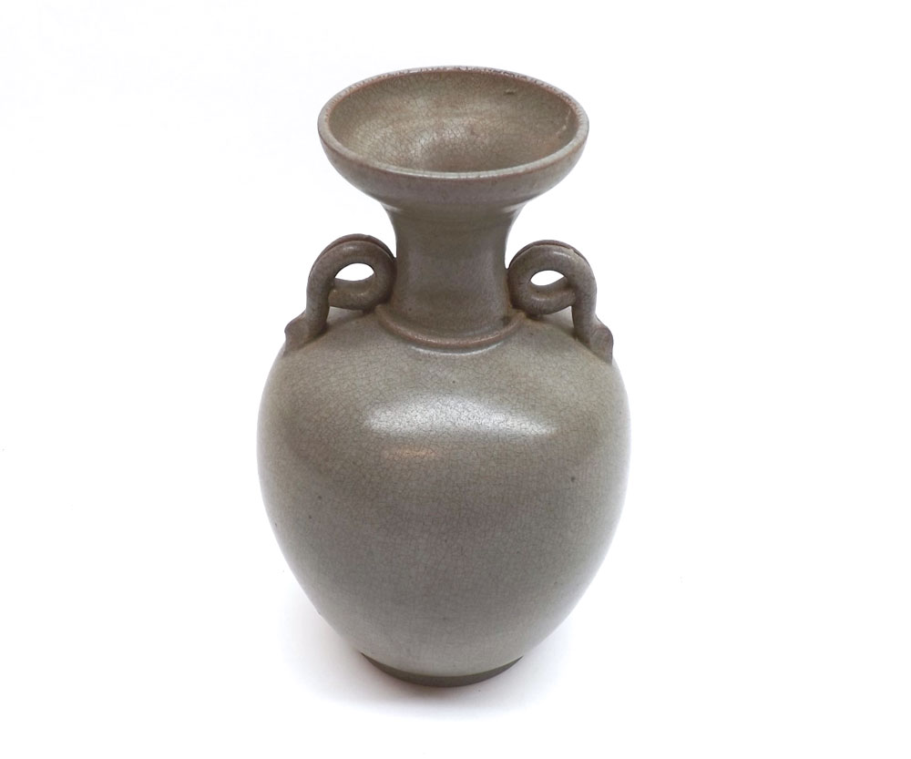A Chinese double handled Cylinder Vase with flared lip, decorated with a crackle glaze, 7 ¼” high