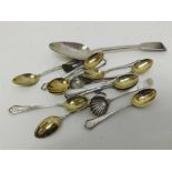 Mixed lot comprising twelve early 20th Century Continental 800 grade white metal Coffee Spoons,