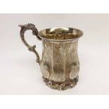 Victorian small Silver Tankard, the body decorated with bright cut detail and small floral panels