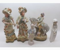 Mixed lot: four early 20th Century Continental figures modelled as a young couple, a young girl