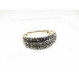 Late 20th Century hallmarked 9ct Gold Ring set with four bands of small Brilliant Cut Diamonds,