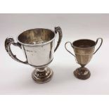 Mixed lot comprising 20th Century Birmingham hallmarked double handled small Trophy Cup raised on