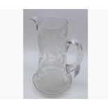Victorian engraved clear glass Jug of tapering form, decorated with palm trees, foliage and tropical