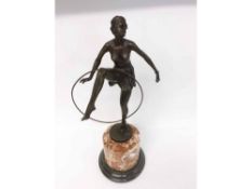 Bronze Art Deco style figure after D Alonzo raised on a circular marble base, 18 ½” high in total