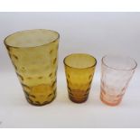 Group of three Whitefriars Dimpled Vases of tapering circular form, two of Amber colouration, the