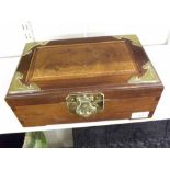 A 20th Century Oriental Hardwood Jewel Box, brass-bound corners and similar drop handles to either