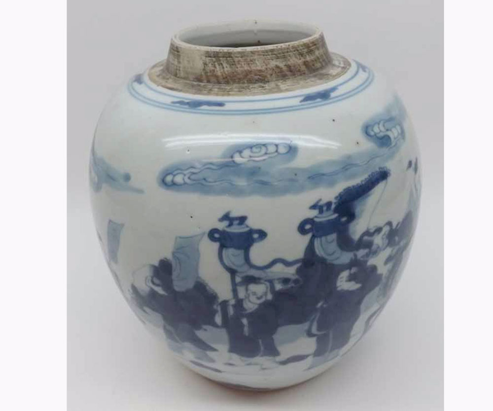 A Chinese large Ginger Jar (lid missing), painted in underglaze blue with an all over scene of