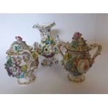 A pair of English two-handled Covered and Balustered Pot-Pourri Vases, encrusted with flowers and