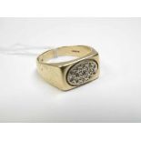 Gent’s hallmarked 9ct Gold Signet Ring, a front oval panel set with small Diamond, 6.5gm all in