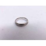 A high grade precious metal Wedding Ring (tests for 18ct White Gold), weight 4.5gm
