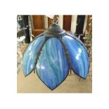 A Decorative multi-coloured Glass Hanging Light, with base metal framed moulded with foliage etc, of