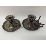 Pair of Victorian Silver plated Chamber Sticks of frilled circular form, complete with Snuffers,