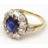 An early/mid-20th Century Sapphire and Diamond Cluster Ring, the sapphire measuring 8,66mm x 7,