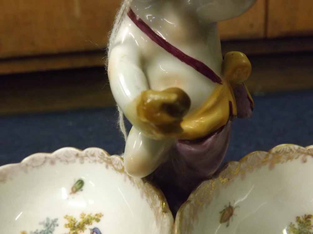 A Berlin Porcelain Cruet, crested with a central figure of a putto, the two bowls each painted in - Image 4 of 4