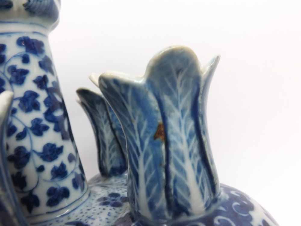 An Oriental Posy Vase of lobed baluster form, decorated throughout in underglaze blue with twining - Image 2 of 4