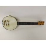 A mid-20th Century four-string Banjolele, total length 23 ½” together with leatherette case