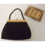 A mid-20th Century black beadwork Ladies evening bag with pierced gilt metal clasp and black satin