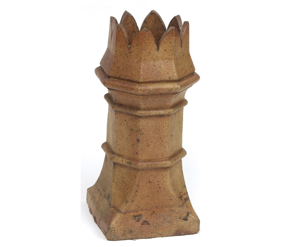 A Stoneware Chimney Pot of octagonal form with hipped rim, 32” high