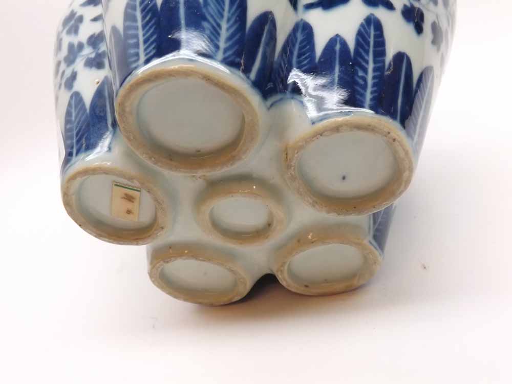 An Oriental Posy Vase of lobed baluster form, decorated throughout in underglaze blue with twining - Image 4 of 4