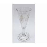 A late 18th/early 19th Century Conical Short Ale Glass, the body etched with foliage and raised on a