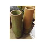 A near pair of Earthenware Chimney Pots of conical circular stepped form, 37” high