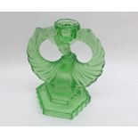 Art Deco Uranium glass novelty Candlestick modelled as a lady with flowing dress and arms aloft,