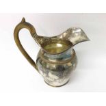 19th Century Silver plate on Copper Jug fitted with looped wooden handle, 8” high