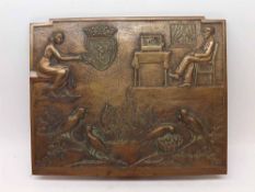 A small bronze Wall Plaque decorated with interior scene of birds amongst foliage etc, bears