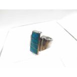 White metal and Opal fragment mounted Dress Ring stamped “925”