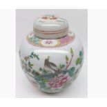 A Chinese Ginger Jar decorated in famille verte and rose with birds in foliage below a