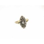 Late 19th/early 20th Century hallmarked 18ct Gold Ring, a marquise shaped panel set with small Old