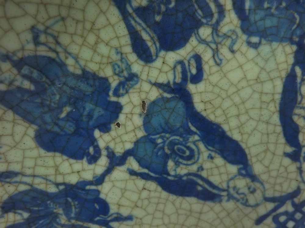 A 20th Century Oriental Circular Plate, decorated in underglaze blue with figures on a crackle glaze - Image 3 of 6