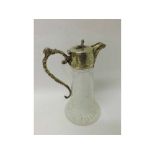 19th or early 20th Century Silver plated mounted cut clear glass Claret Jug with scrolled handle and