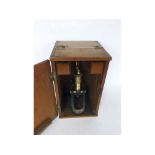 An early 20th Century Mahogany Cased Patinated and Lacquered Brass Monocular Microscope, Henry