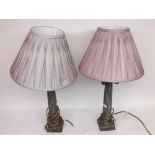 A pair of reproduction bronze-effect Table Lamps with scrolled capitals and reeded columns and