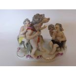 A Meissen Group of five Bacchanalian Putti, each in various poses and painted throughout in colours,
