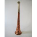 Copper and nickel hunting horn by Swaine & Adeney of London Has been well used, some dents