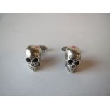 Silver cufflinks in the form of skulls good condition