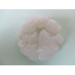 White jade circular carved pendant of two children Good general condition   .