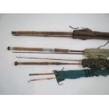 Four vintage sea & spinning rods including an Allcocks split cane big game rod in makers bag